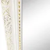A close-up view of a decorative mirror frame with ornate gold detailing. Náhľad obrázku produktu
