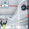 A construction worker uses a laser level in a building under construction. Anteprima dell’immagine prodotto