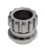A close-up studio shot of a metal food grinder coupling against a white background. Produktbild-Vorschau