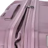 A close-up shot of a pink suitcase zipper and handle. Produktbild-Vorschau