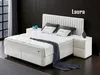 A bedroom scene featuring a bed. Produktbild-Vorschau