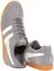A pair of grey Gola Harrier sneakers with white stripes and brown soles, shown from a slightly elevated angle against a white background. Produktbild-Vorschau