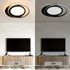 A collage showing a modern ceiling light and a living room setup with a TV. Náhled obrázku produktu