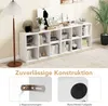 A white modular shelving unit filled with various decorative items and books, placed in a room with a floor lamp and a potted plant. The bottom part of the image shows close-ups of product features. Náhľad obrázku produktu