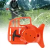 A person using a string trimmer in a mountainous landscape, with a close-up of the starter assembly in the foreground. Náhľad obrázku produktu