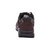 The back view of a brown hiking shoe against a white background. Anteprima dell’immagine prodotto