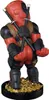 A figurine of Deadpool standing on a pile of gold coins. Anteprima dell’immagine prodotto