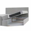 A cutaway view of a bed showing its internal structure and storage compartment. Produktbild-Vorschau