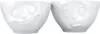 Two white ceramic bowls with faces molded into them, placed side-by-side against a white background. Anteprima dell’immagine prodotto