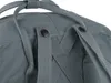 A close-up view of the top part of a grey backpack, showing the straps and attachment points. Náhled obrázku produktu