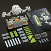 A Mega Pokemon Geodude building set is displayed with its instruction manual and loose pieces on a dark surface. Náhľad obrázku produktu