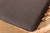 Close-up of a cushion on a rattan chair. Produktbild-Vorschau