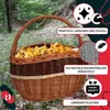 A woven basket filled with chanterelle mushrooms, set in a forest environment. Produktbild-Vorschau