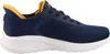 A side view of a blue Skechers Bobs Squad Chaos training shoe with a white sole and yellow accents. Voir les images du produit
