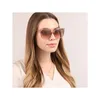 A woman wearing sunglasses. Produktbild-Vorschau