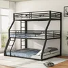 A triple bunk bed in a room with a window and a rug. Podgląd zdjęcia produktu