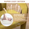 Close-up of a hand pressing into a yellow cushioned chair, with arrows indicating airflow and text describing the foam. Voir les images du produit