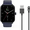 A smartwatch and its charging cable are displayed against a white background. Náhled obrázku produktu
