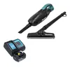 A black and teal Makita cordless vacuum cleaner with accessories and a charger are displayed against a white background. Produktbild-Vorschau