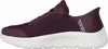 Side view of a purple Skechers slip-on sneaker with a white sole. Anteprima dell’immagine prodotto