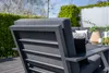 An outdoor lounge set on a wooden deck, with a hedge and fence in the background. Produktbild-Vorschau