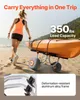 A woman is pulling a kayak cart on a sandy beach near the water. Anteprima dell’immagine prodotto