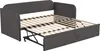 A gray upholstered daybed with its trundle bed pulled out, showing the wooden slats of both mattress bases. Anteprima dell’immagine prodotto