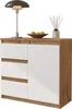A modern sideboard with white drawers and a wood-grain effect frame, decorated with a lamp, a bowl of apples, and a diffuser. Voir les images du produit