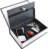 An open book-shaped safe with various items inside. Anteprima dell’immagine prodotto