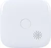 A white, square-shaped device with a circular indentation and a speaker grille. Podgląd zdjęcia produktu