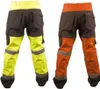 Two pairs of work pants, one yellow and one orange, shown from the back. Produktbild-Vorschau