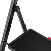 A close-up view of the joint and step of a black folding step stool. Podgląd zdjęcia produktu