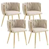A set of four beige dining chairs with gold legs, presented against a white background. Anteprima dell’immagine prodotto