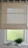 A linen Roman blind is shown hanging over a window. A small potted plant and a decorative ceramic object are on the windowsill below. Produktbild-Vorschau
