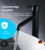 A black faucet with water flowing into a white sink, with marketing text and icons. Produktbild-Vorschau