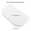A white mattress protector for a baby bed. Produktbild-Vorschau