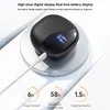 A black charging case for wireless earbuds is shown on a white and gray circular charging pad, with a white USB-C cable connected. Text overlays describe features and battery life. Náhľad obrázku produktu