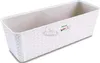 A white rectangular planter box with a woven texture. Voir les images du produit
