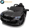 A black BMW M4 electric ride-on car for children. Anteprima dell’immagine prodotto