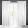 A pair of white sheer curtains hanging in front of a window. Produktbild-Vorschau