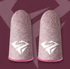Two pink finger sleeves with a white logo are shown against a purple background. Produktbild-Vorschau