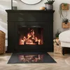 A cozy living room scene with a fireplace, rug, and furniture. Produktbild-Vorschau