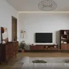 A modern living room with a TV, entertainment center, and shelving unit. Produktbild-Vorschau