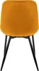 A back view of a mustard yellow velvet dining chair with black metal legs, isolated on a white background. Náhľad obrázku produktu