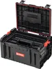 A black Qbrick System Pro Set 3 tool box with its lid open, showing the interior compartments. The box has red latches and a red seal around the lid. Náhled obrázku produktu