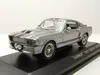 A silver 1967 Ford Shelby Mustang GT500 'Eleanor' model car displayed on a black stand. Produktbild-Vorschau