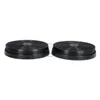 Two circular charcoal filters on a white background. Produktbild-Vorschau