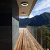 A modern balcony with wooden decking and a view of mountains and a lake. Náhled obrázku produktu