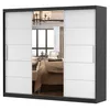 A sliding door wardrobe with mirrored doors, reflecting a bedroom interior. Produktbild-Vorschau