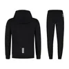 A black tracksuit set, consisting of a hoodie and pants, displayed against a white background. Produktbild-Vorschau
